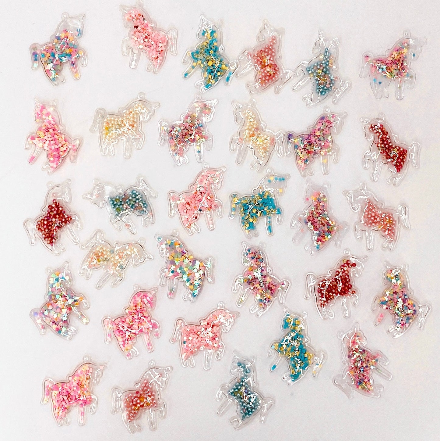 Load image into Gallery viewer, &amp;quot;Unicorn&amp;quot; Sparkly Embellishments Pack of 30
